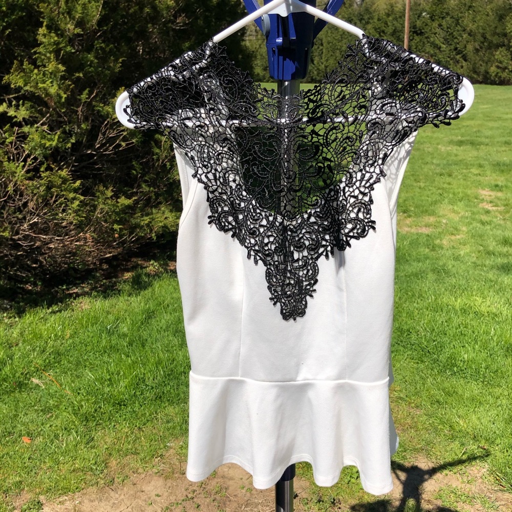 Charlotte Russe white peplum top with black lace
